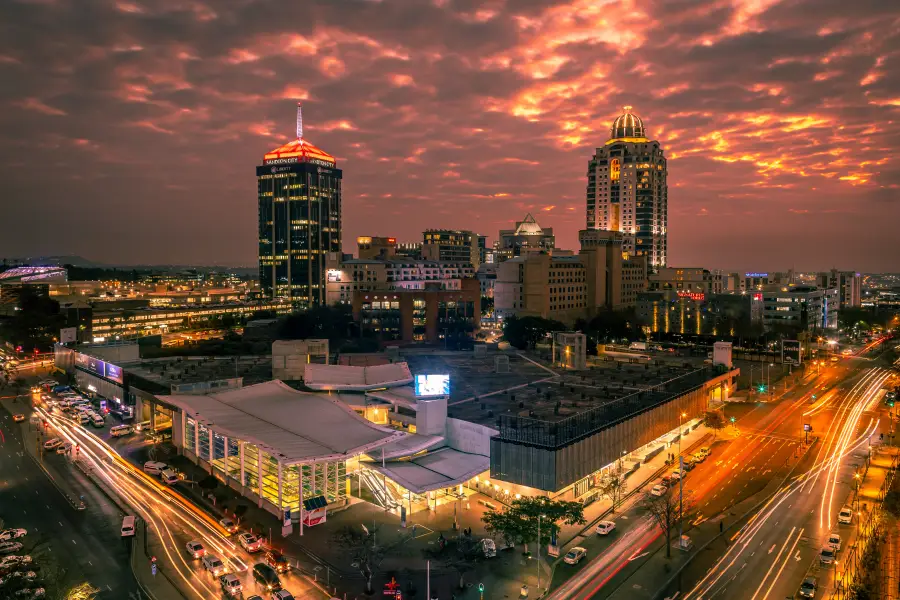 Sandton skyline business district at golden hour showing the Johannesburg African financial center at dusk.