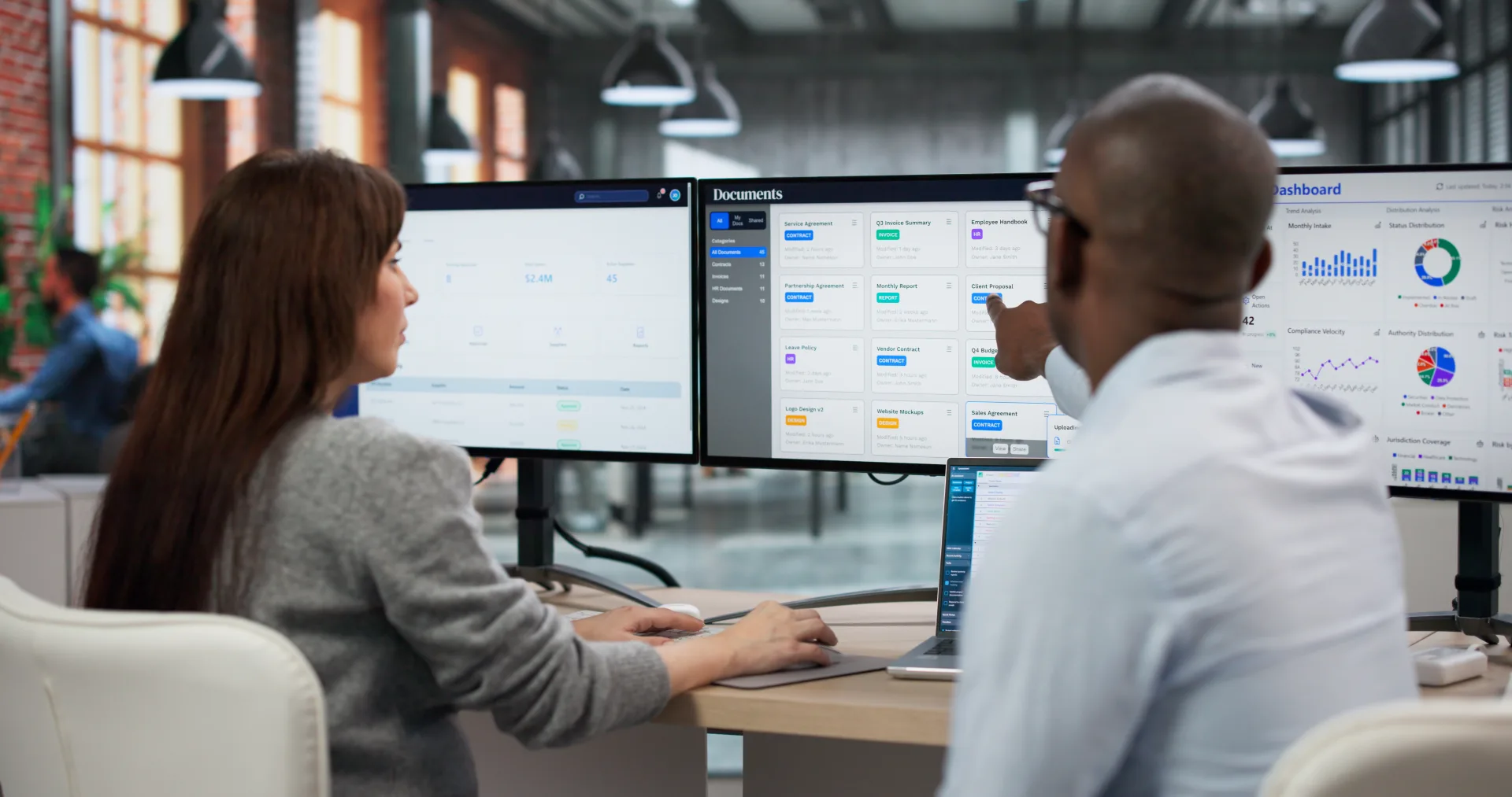 Multidisciplinary Africa technology consulting team reviewing enterprise dashboard for managed IT services delivery.