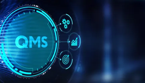 Glowing digital QMS interface ringed by icons for search, analytics, goals, gears and personnel on a dark blue background.