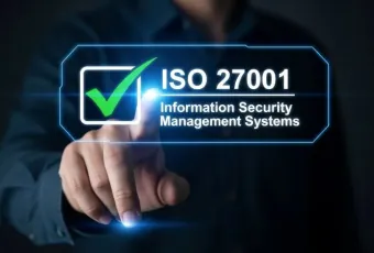 A person hand with ISO 27001 and a check mark