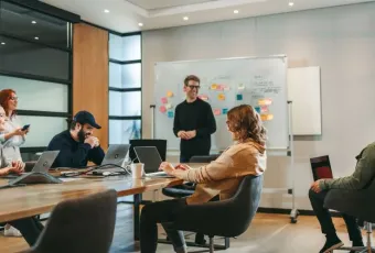 Group planning website design with vision board