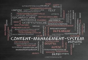 Content management system and Drupal words on a blackboard