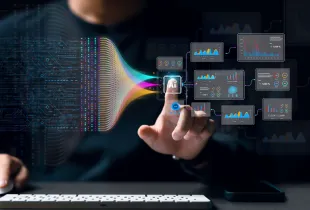 Professional interacting with AI chip interface generating multiple data analytics dashboards in a dark digital environment.