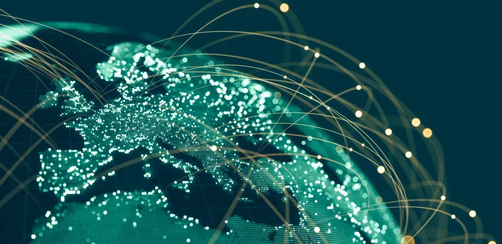 Glowing digital globe showing Europe and Africa with golden arc connections representing global enterprise IT network infr...